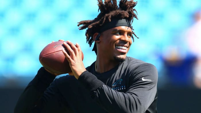 Carolina Panthers quarterback Cam Newton warms up prior to a game against the Los Angeles Rams at Bank of America Stadium.